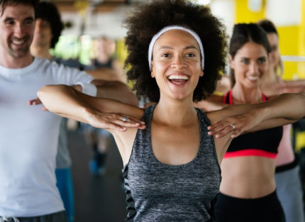 Men and women in an exercise class